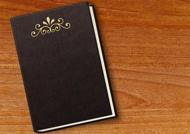 a book, embossing, leather, empty, book cover, front and back covers, black, wood, wooden table, table, brown, gold, blank book, engraving, noble, closed, leather binding, literature, agenda, to study, symbolism, decorative, decoration, deco, training, read, template, greeting card, to learn, school, knowledge, books, notebook, diary, studbook, book cover, book cover, book cover, book cover, book cover. Weiterverarbeitung Druck: Falzen, Binden und Veredeln für drei fiktive Aufträge planen